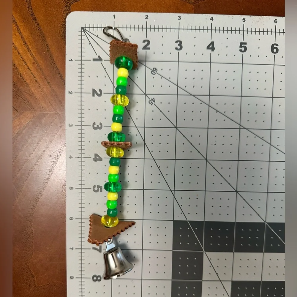 Vibrant Green and Yellow Bird Toy with Bell